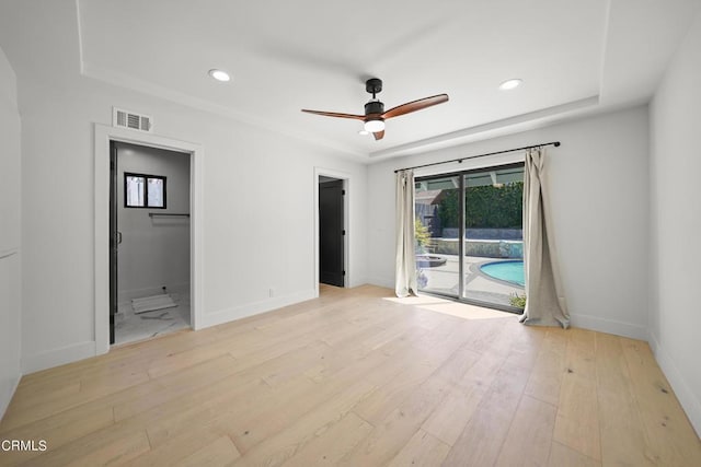 9518 Forbes Ave, Northridge, CA 91343 - empty room with a ceiling fan, light wood-type flooring, a raised ceiling, and recessed lighting