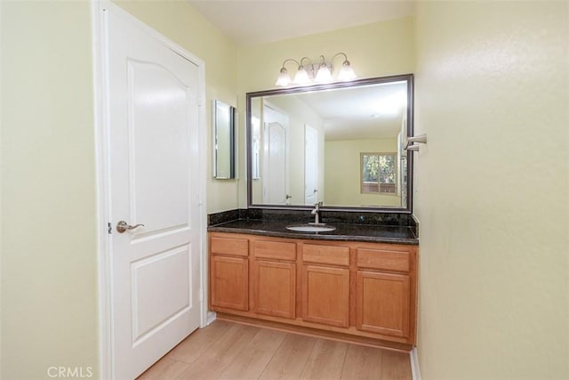 1345 Cabrillo Park Dr Unit A06, Santa Ana, CA 92701 - bathroom with vanity and wood finished floors