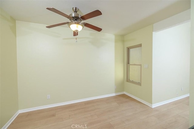 1345 Cabrillo Park Dr Unit A06, Santa Ana, CA 92701 - unfurnished room featuring light wood finished floors and ceiling fan