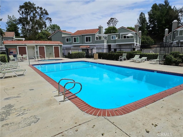 1060 Golden Springs Dr Unit B, Diamond Bar, CA 91765 - community pool with a patio area, a community hot tub, and a residential view