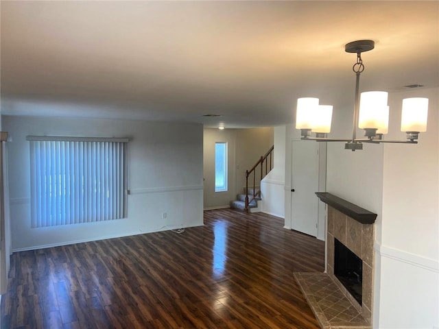 1060 Golden Springs Dr Unit B, Diamond Bar, CA 91765 - unfurnished living room with wood finished floors, a chandelier, stairs, and a tiled fireplace