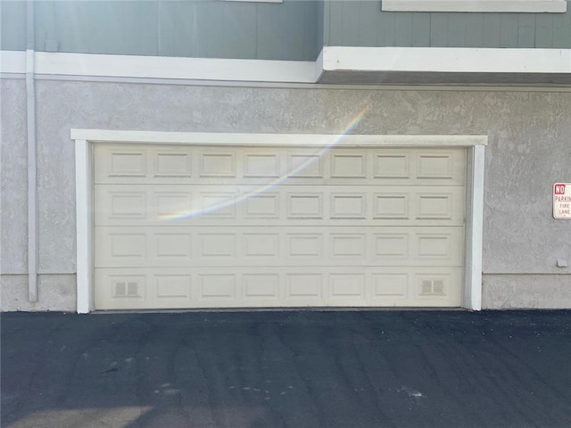 1060 Golden Springs Dr Unit B, Diamond Bar, CA 91765 - garage featuring asphalt driveway