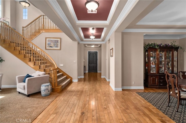 13812 Breeders Cup Dr, Rancho Cucamonga, CA 91739 - entrance foyer featuring stairway, hardwood / wood-style flooring, and crown molding