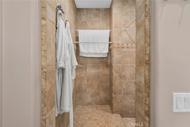 13812 Breeders Cup Dr, Rancho Cucamonga, CA 91739 - full bathroom with a tile shower and a textured wall
