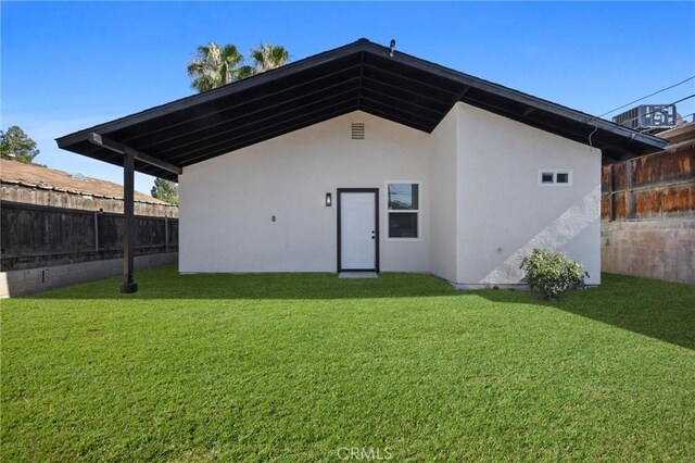326 Water St, Bakersfield, CA 93305 - back of house featuring stucco siding