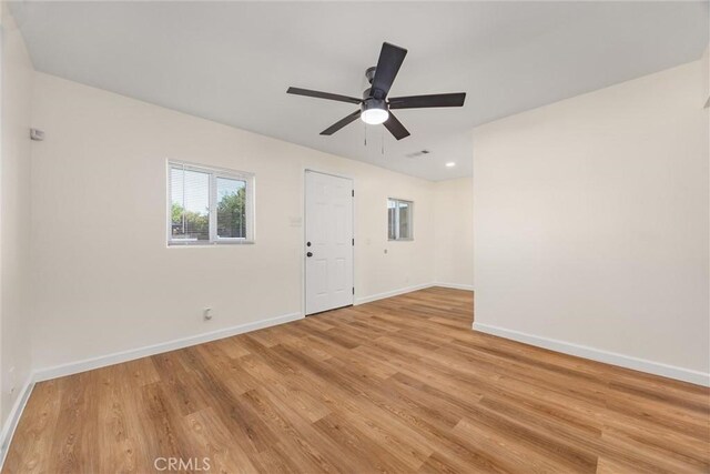 326 Water St, Bakersfield, CA 93305 - spare room with light wood finished floors and ceiling fan