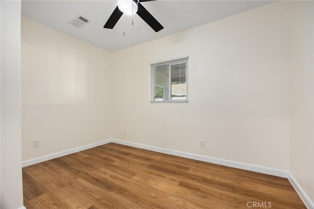 326 Water St, Bakersfield, CA 93305 - empty room with wood finished floors and a ceiling fan