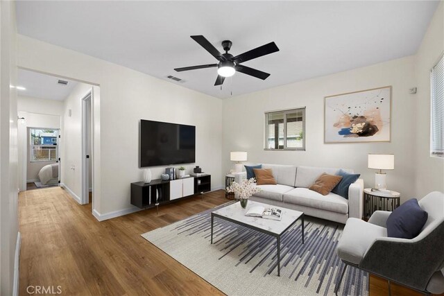 326 Water St, Bakersfield, CA 93305 - living area with wood finished floors and ceiling fan