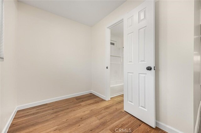 326 Water St, Bakersfield, CA 93305 - spare room with light wood-type flooring and baseboards