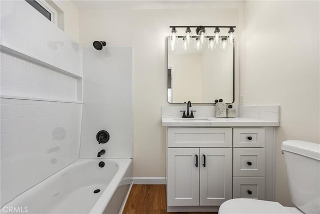 326 Water St, Bakersfield, CA 93305 - full bath featuring vanity, wood finished floors, and bathing tub / shower combination