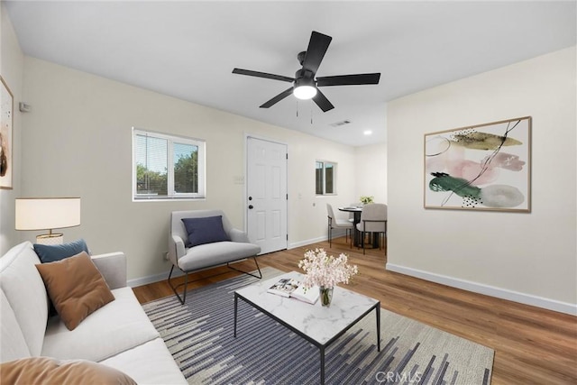 326 Water St, Bakersfield, CA 93305 - living area featuring wood finished floors and a ceiling fan