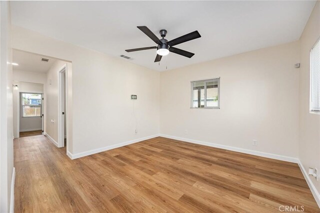 326 Water St, Bakersfield, CA 93305 - spare room featuring light wood finished floors and a ceiling fan