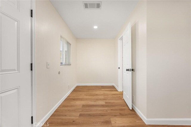 326 Water St, Bakersfield, CA 93305 - hall with light wood-style floors and recessed lighting