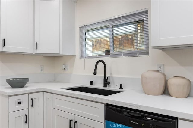 326 Water St, Bakersfield, CA 93305 - kitchen featuring dishwasher, white cabinets, and light stone countertops