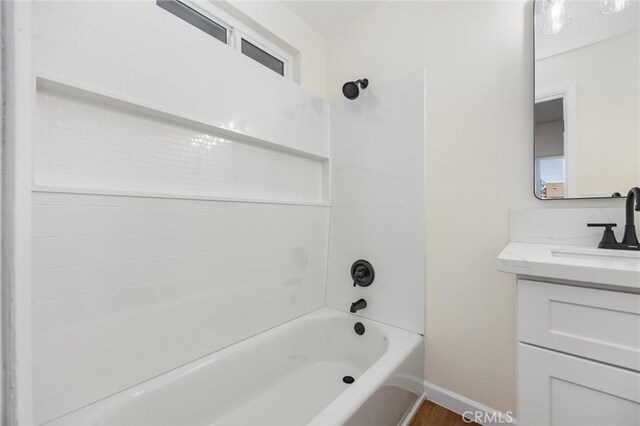 326 Water St, Bakersfield, CA 93305 - bathroom with vanity and shower / tub combination