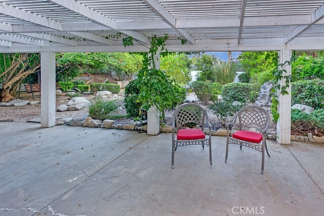 22570 Napa St, West Hills, CA 91304 - view of patio / terrace featuring a pergola