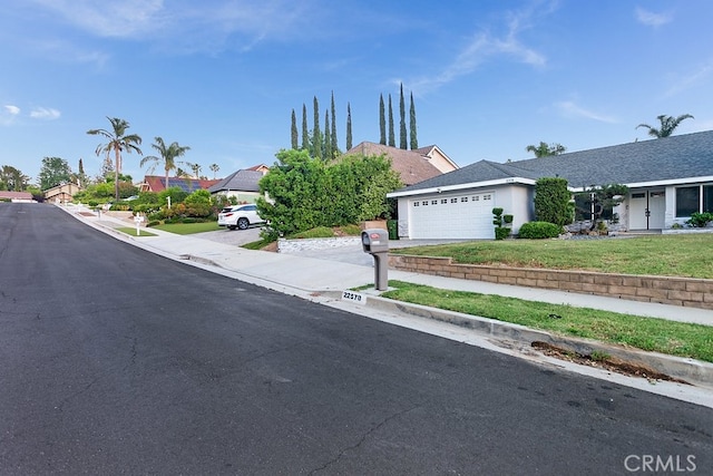 22570 Napa St, West Hills, CA 91304 - view of asphalt street featuring curbs