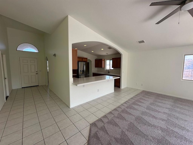 31100 Desert Palm Dr, Thousand Palms, CA 92276 - entryway with arched walkways, lofted ceiling, light tile patterned floors, ceiling fan, and recessed lighting