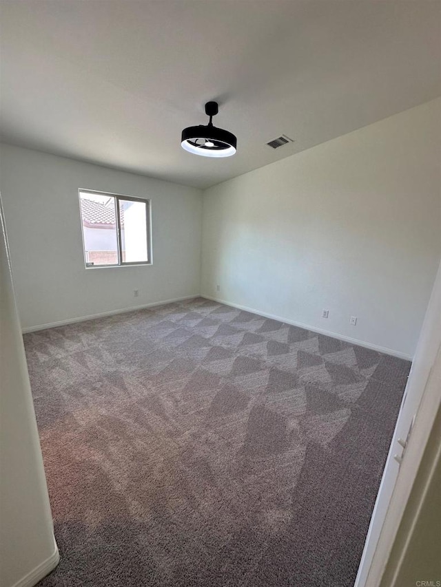 31100 Desert Palm Dr, Thousand Palms, CA 92276 - unfurnished room featuring baseboards and carpet floors