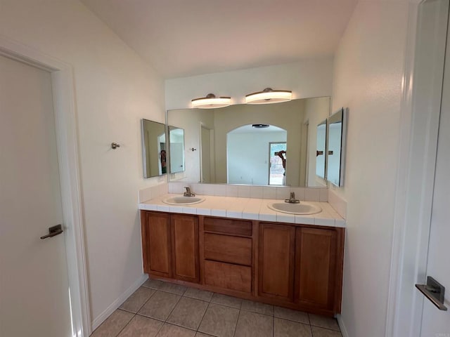31100 Desert Palm Dr, Thousand Palms, CA 92276 - full bathroom with double vanity and tile patterned floors