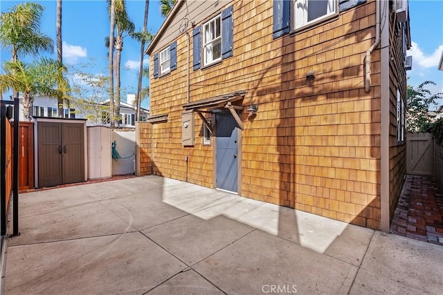 135 Turquoise Ave, Newport Beach, CA 92662 - view of property exterior featuring a gate and a patio