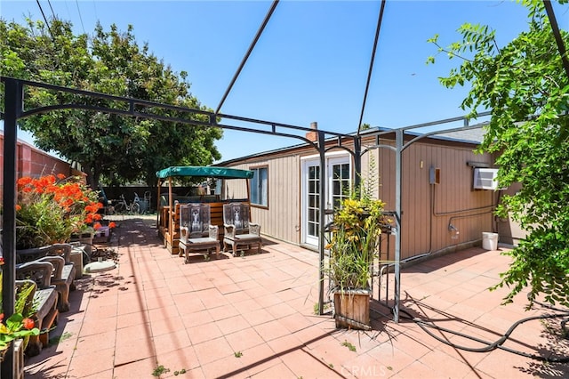 1002 N Iroquois Ave, Anaheim, CA 92801 - view of patio with a wall mounted AC