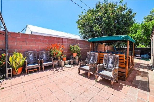 1002 N Iroquois Ave, Anaheim, CA 92801 - fenced backyard featuring a patio area
