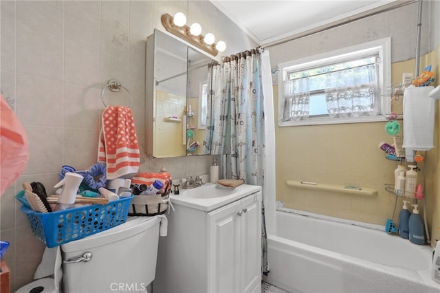 1002 N Iroquois Ave, Anaheim, CA 92801 - bathroom with tile walls, vanity, shower / bath combo, and ornamental molding