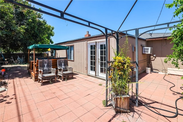 1002 N Iroquois Ave, Anaheim, CA 92801 - view of patio / terrace with a wall unit AC