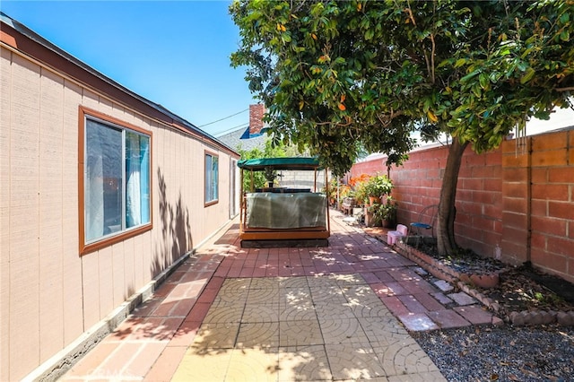 1002 N Iroquois Ave, Anaheim, CA 92801 - fenced backyard featuring a patio area