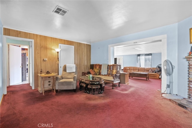 1002 N Iroquois Ave, Anaheim, CA 92801 - carpeted living room with wood walls