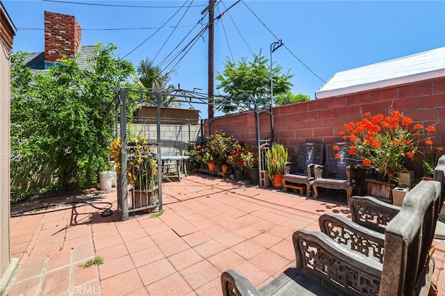 1002 N Iroquois Ave, Anaheim, CA 92801 - fenced backyard featuring a patio