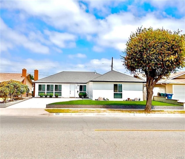 6091 Larchwood Dr, Huntington Beach, CA 92647 - single story home with a front yard and driveway
