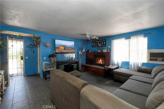 4760 Crest Ave, Riverside, CA 92503 - living room featuring a brick fireplace and a wall mounted air conditioner
