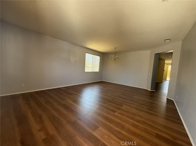 12673 Field Way, Victorville, CA 92395 - empty room featuring a chandelier and dark wood finished floors