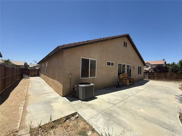 12673 Field Way, Victorville, CA 92395 - rear view of house featuring a fenced backyard, stucco siding, and a patio