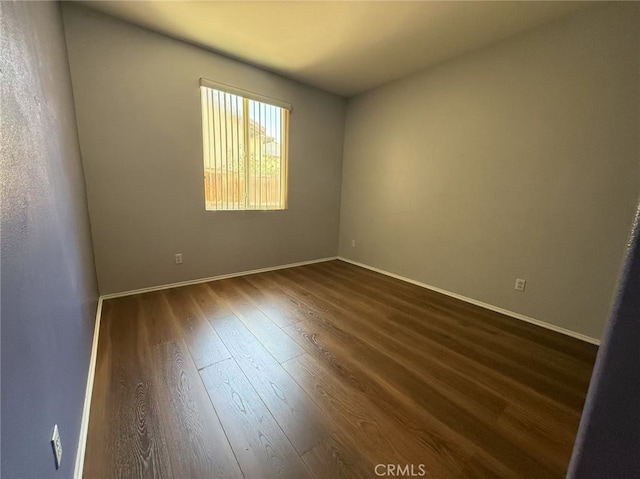 12673 Field Way, Victorville, CA 92395 - spare room featuring dark wood-style floors and baseboards