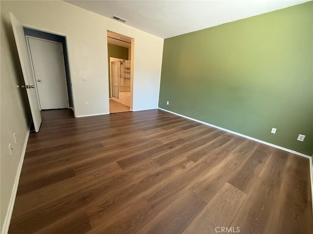 12673 Field Way, Victorville, CA 92395 - unfurnished bedroom with dark wood-style floors and baseboards