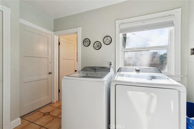 315 E Clinton Ave, Fresno, CA 93704 - laundry room with washer and clothes dryer and light tile patterned flooring