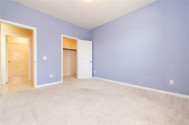 13246 Baxter Springs Dr, Rancho Cucamonga, CA 91739 - unfurnished bedroom featuring carpet, a closet, and a walk in closet