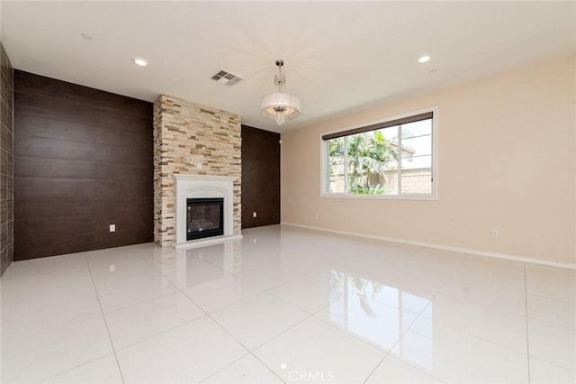 13246 Baxter Springs Dr, Rancho Cucamonga, CA 91739 - unfurnished living room featuring a large fireplace, light tile patterned floors, and recessed lighting