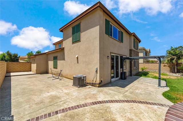 13246 Baxter Springs Dr, Rancho Cucamonga, CA 91739 - rear view of house featuring stucco siding, a patio area, and a fenced backyard