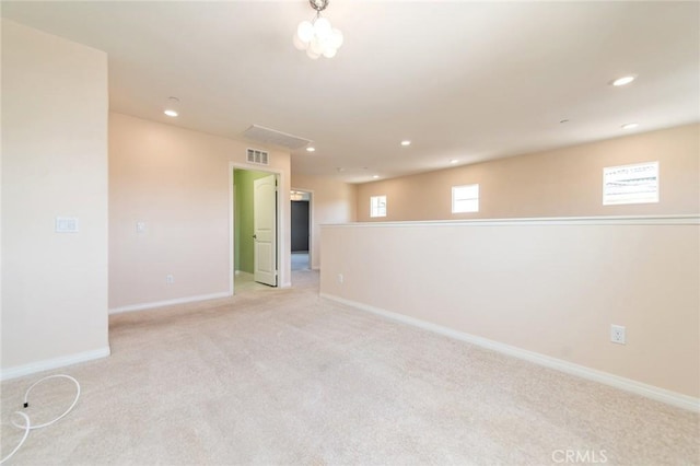 13246 Baxter Springs Dr, Rancho Cucamonga, CA 91739 - spare room featuring recessed lighting, light colored carpet, and plenty of natural light