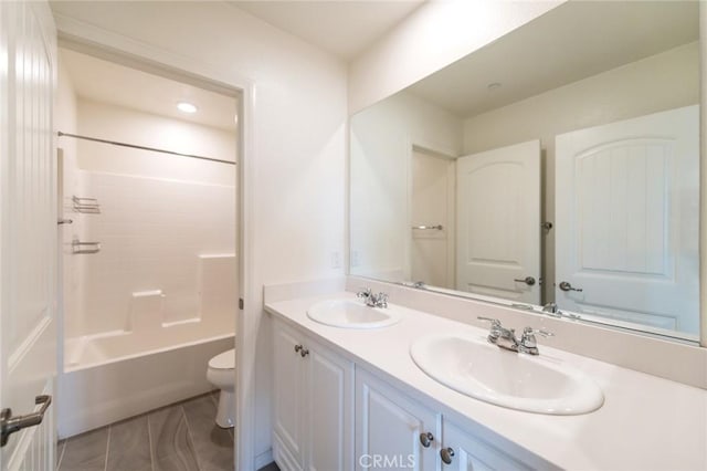 13246 Baxter Springs Dr, Rancho Cucamonga, CA 91739 - bathroom with double vanity, shower / washtub combination, and tile patterned floors