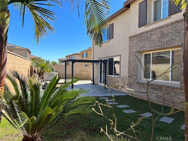 13246 Baxter Springs Dr, Rancho Cucamonga, CA 91739 - fenced backyard with a patio area and a pergola