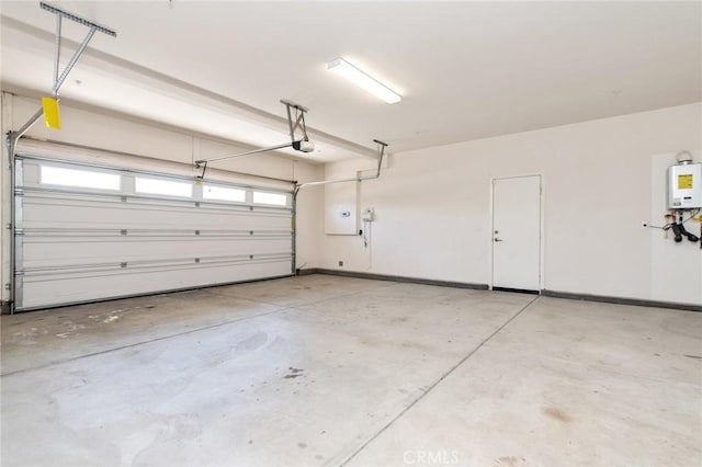 13246 Baxter Springs Dr, Rancho Cucamonga, CA 91739 - garage with a garage door opener and water heater
