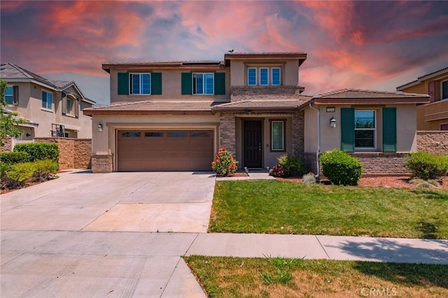13246 Baxter Springs Dr, Rancho Cucamonga, CA 91739 - view of front facade with stucco siding, concrete driveway, an attached garage, roof mounted solar panels, and stone siding