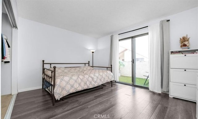 9525 Sylmar Ave Unit 2, Panorama City, CA 91402 - bedroom with wood finished floors and access to exterior