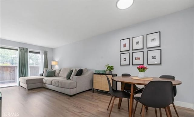 9525 Sylmar Ave Unit 2, Panorama City, CA 91402 - living area with light wood-type flooring and baseboards