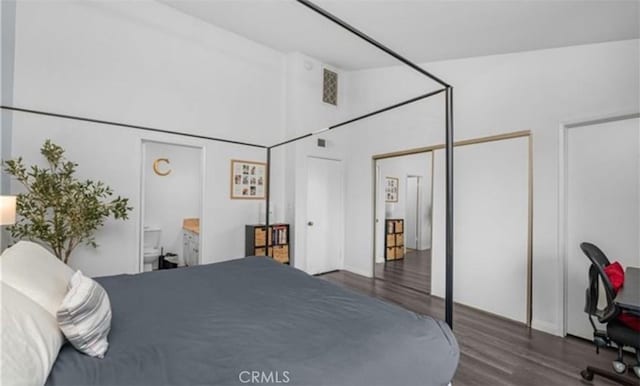 9525 Sylmar Ave Unit 2, Panorama City, CA 91402 - bedroom with wood finished floors and two closets